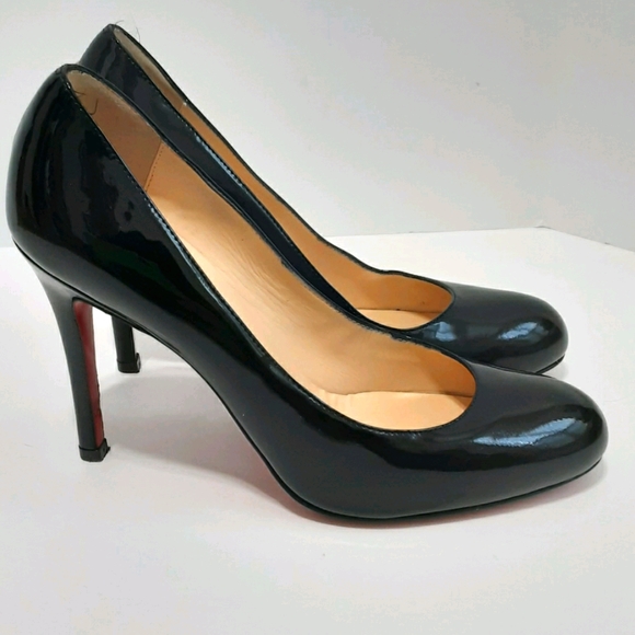Christian Louboutin Black Patent leather heels.